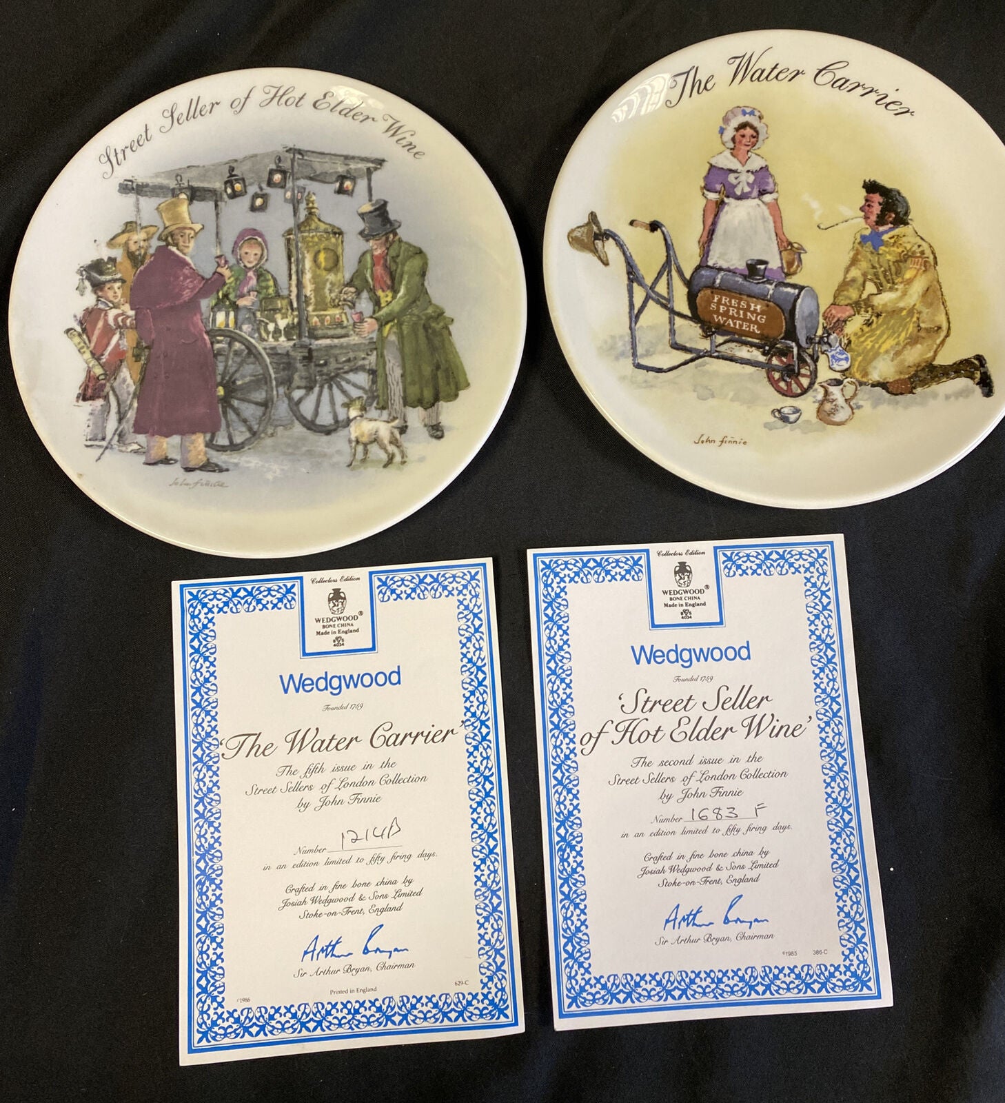 Wedgwood 1986 LONDON Collectors plates x2 Hot Elder Wine & Water Carrier -(7841