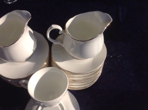 Mayfair Bone China - 22 Saucers , 1 Cup , 2 Milk Jugs 3 Plates Used  - (126)