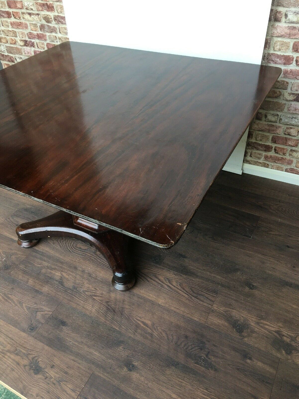 Antique Mahogany Very large square reception table on octagonal baluster column