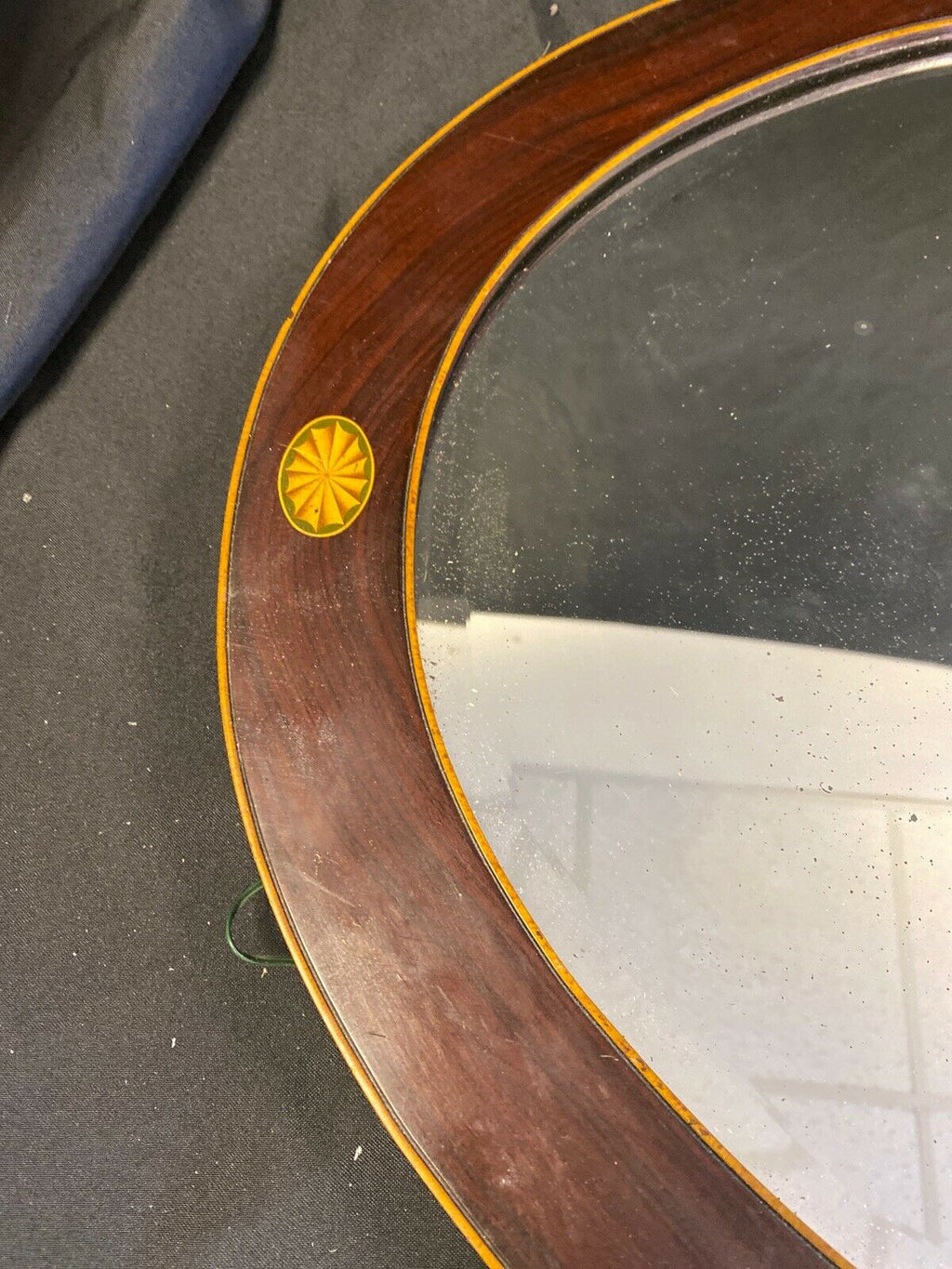 Antique oval wooden bevelled glass wall mirror (7381)