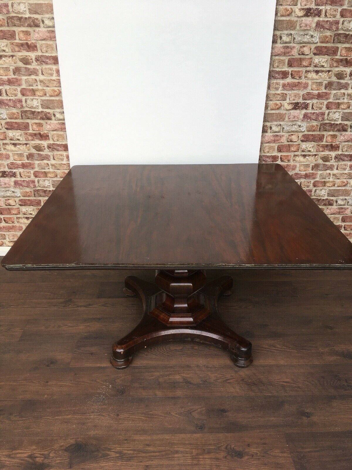 Antique Mahogany Very large square reception table on octagonal baluster column
