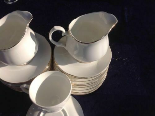 Mayfair Bone China - 22 Saucers , 1 Cup , 2 Milk Jugs 3 Plates Used  - (126)