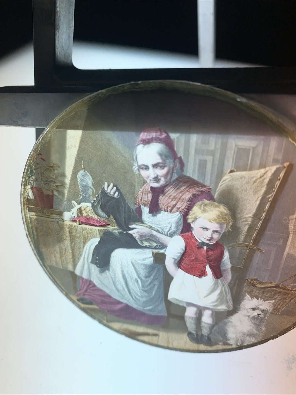 Magic Lantern Victorian Glass Round Handpainted Slide Sewing his trousers (1102)