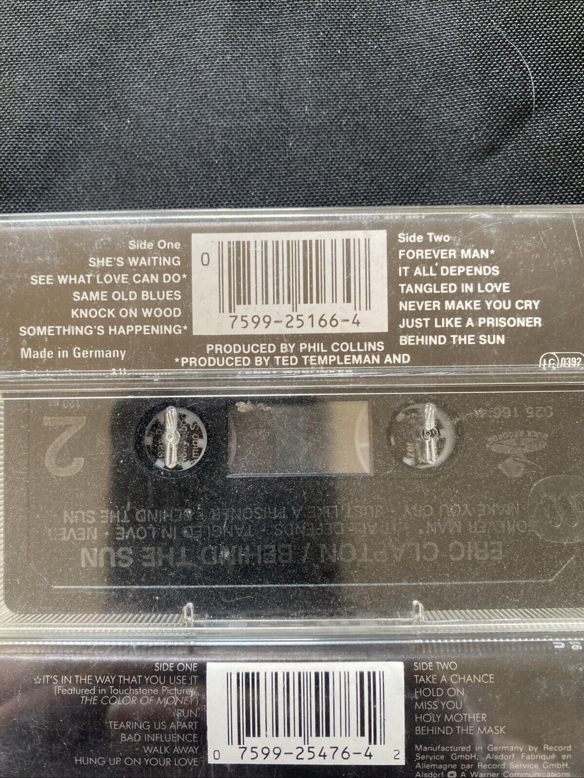 Eric Clapton Cassette Tapes Behind The Sun & August -(5900)