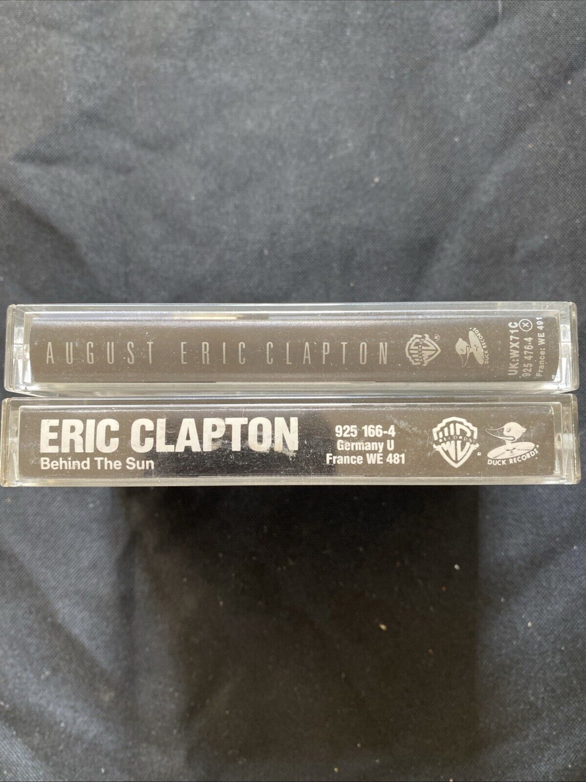Eric Clapton Cassette Tapes Behind The Sun & August -(5900)