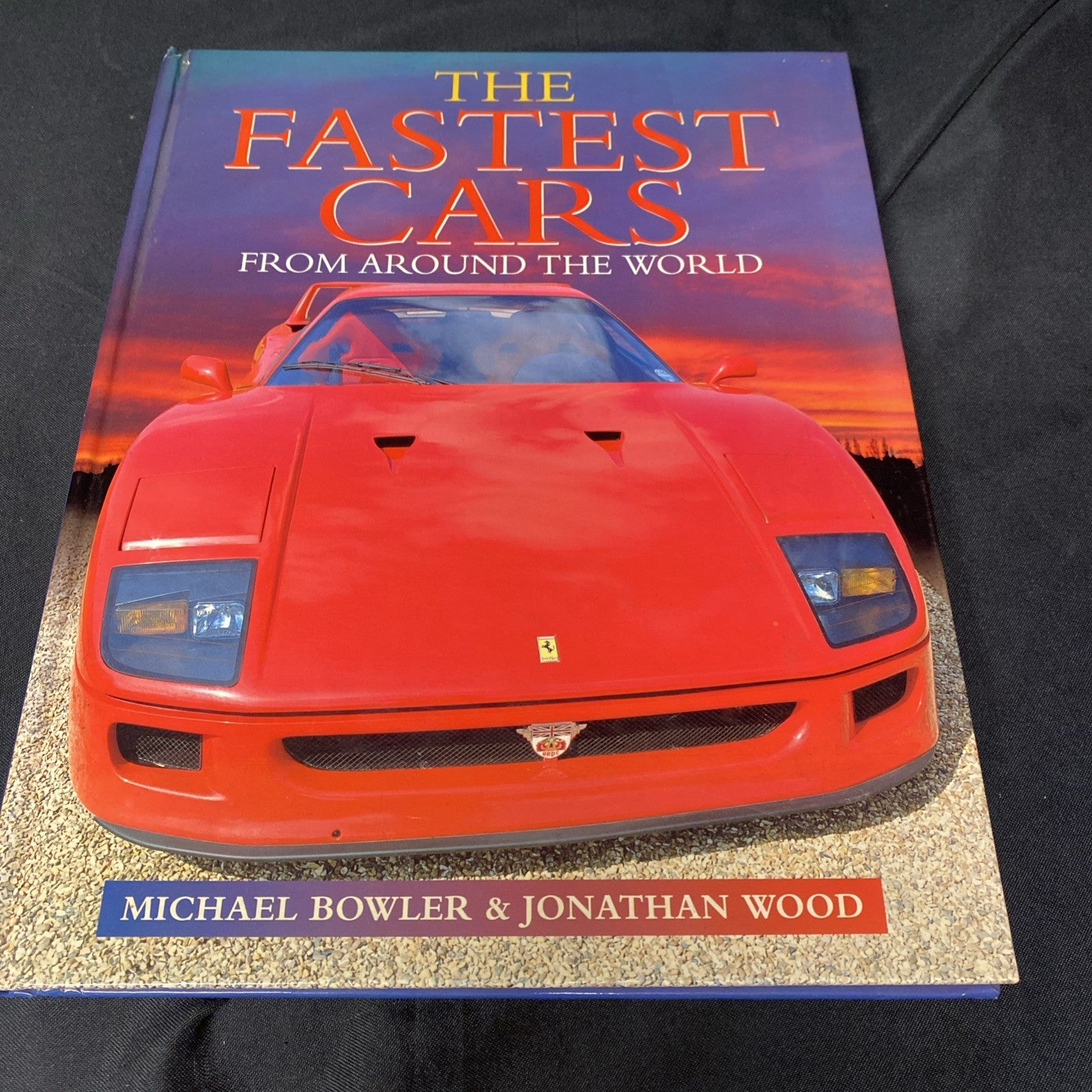 The Fastest Car - Hardback Book 1998 Michael Bowler Ferrari cover - (1397)
