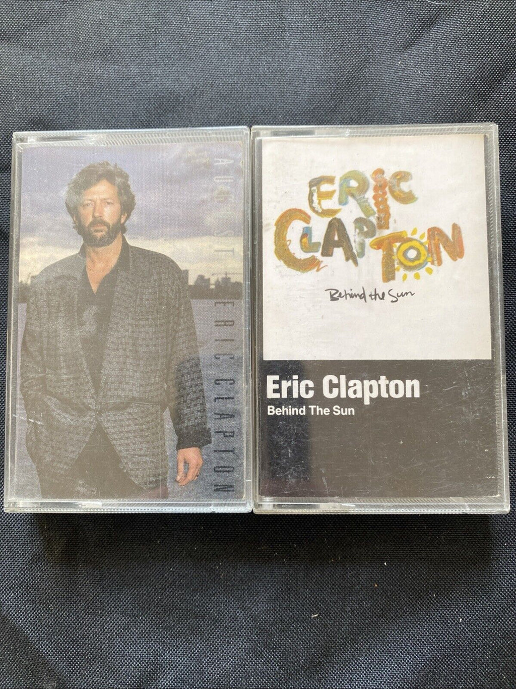 Eric Clapton Cassette Tapes Behind The Sun & August -(5900)