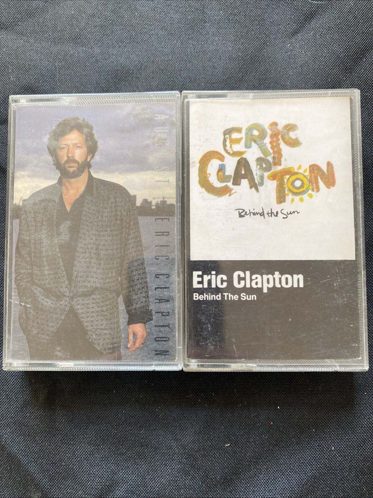 Eric Clapton Cassette Tapes Behind The Sun & August -(5900)