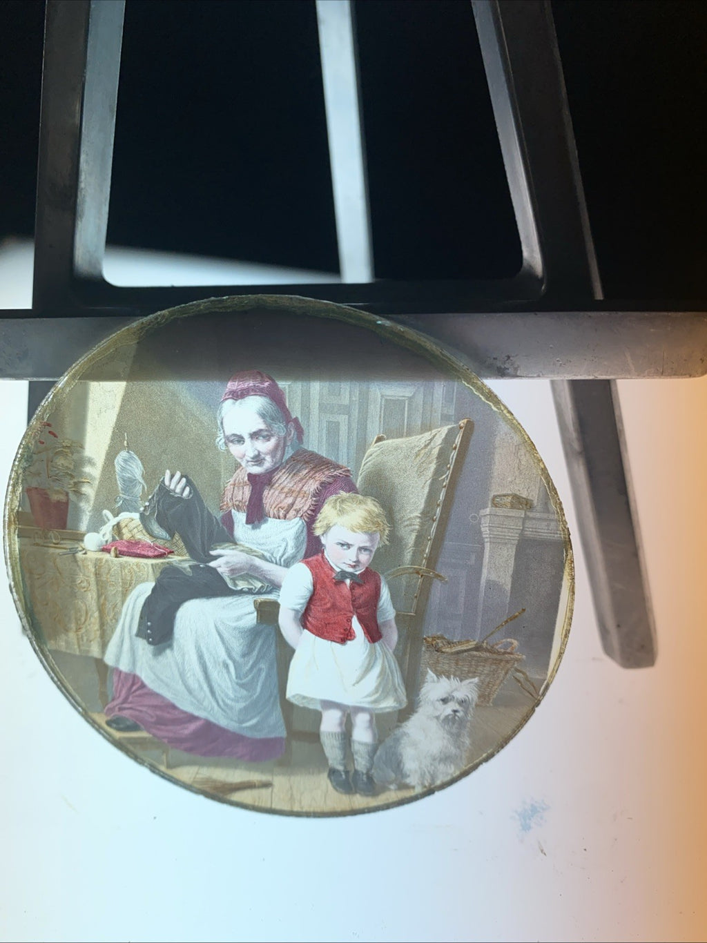 Magic Lantern Victorian Glass Round Handpainted Slide Sewing his trousers (1102)
