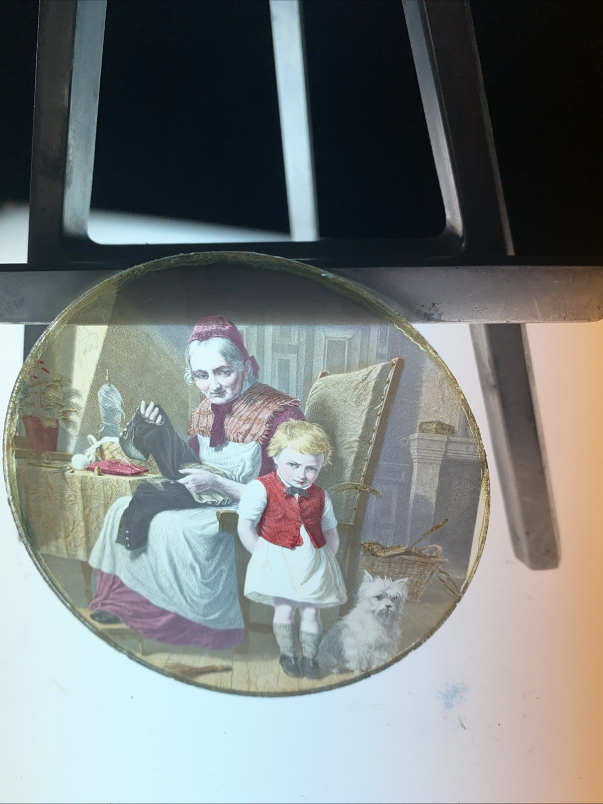 Magic Lantern Victorian Glass Round Handpainted Slide Sewing his trousers (1102)