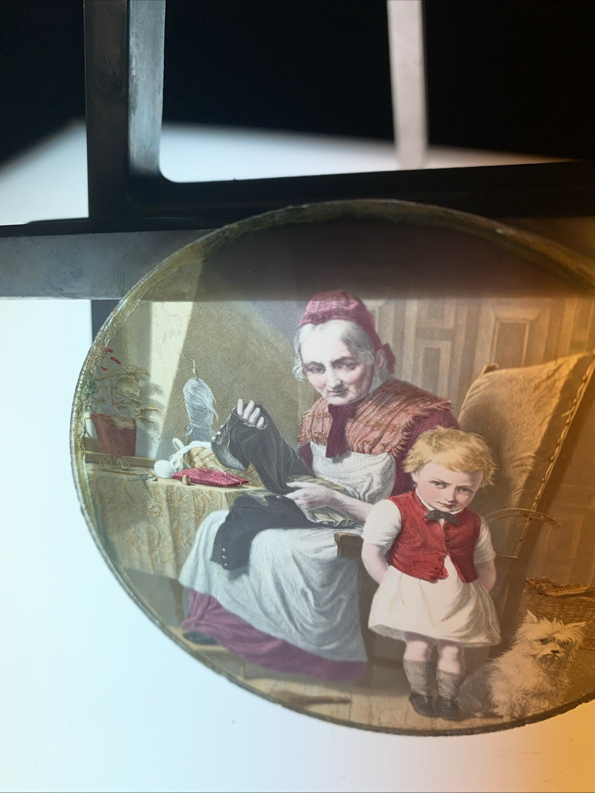 Magic Lantern Victorian Glass Round Handpainted Slide Sewing his trousers (1102)