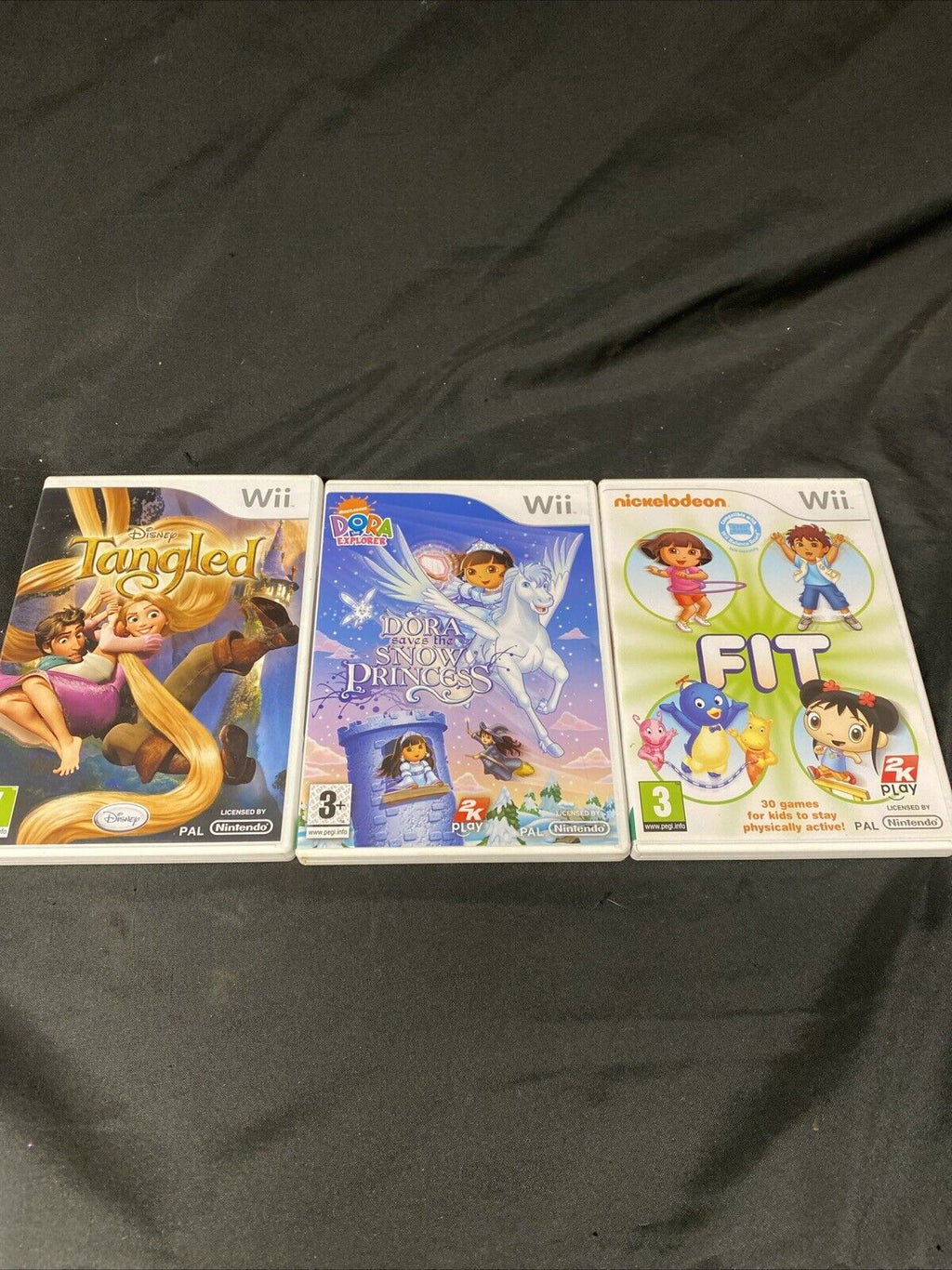 Nintendo WII Bundle 3 Games Inc Disney Tangled and more - (5561)
