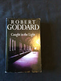 BOOK - CAUGHT IN THE LIGHT - Robert Goddard Hardback 1998 - (8663)
