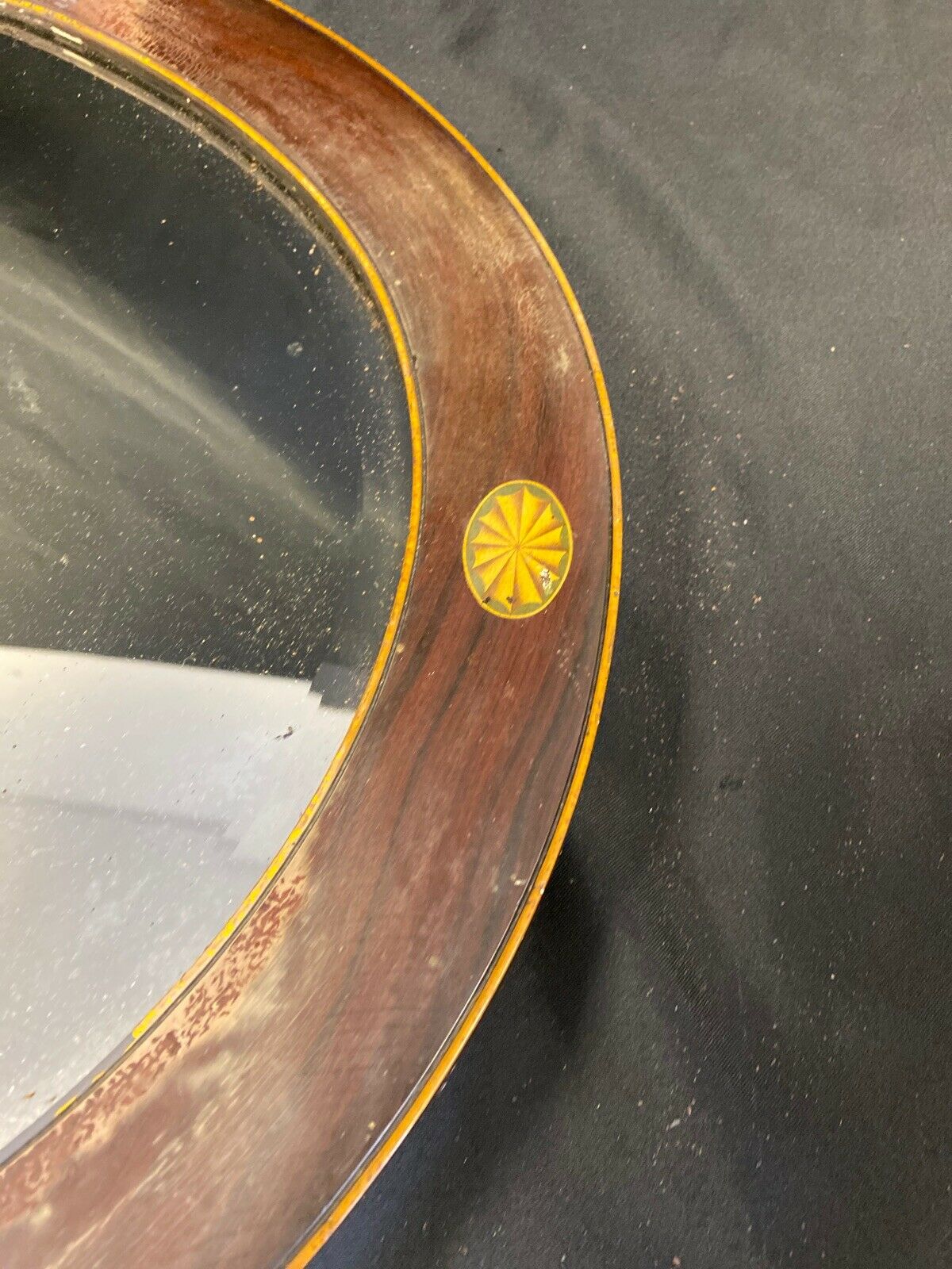 Antique oval wooden bevelled glass wall mirror (7381)