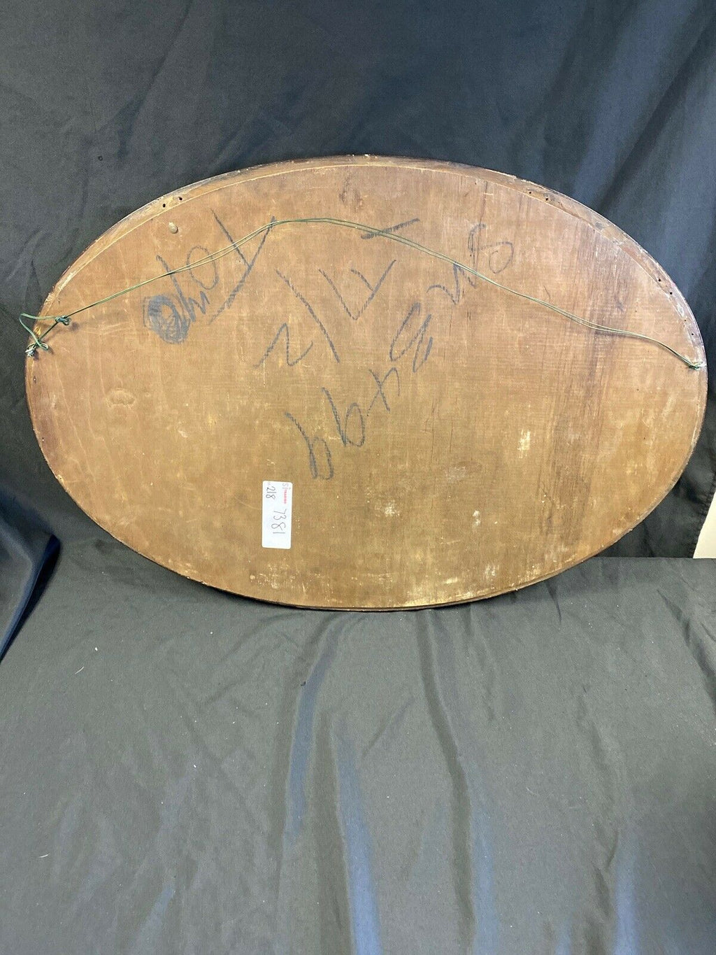 Antique oval wooden bevelled glass wall mirror (7381)