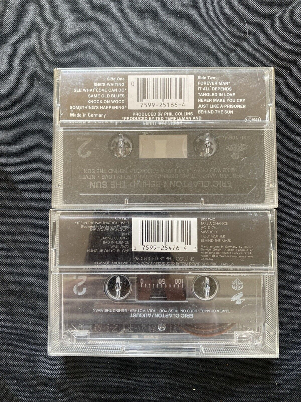 Eric Clapton Cassette Tapes Behind The Sun & August -(5900)