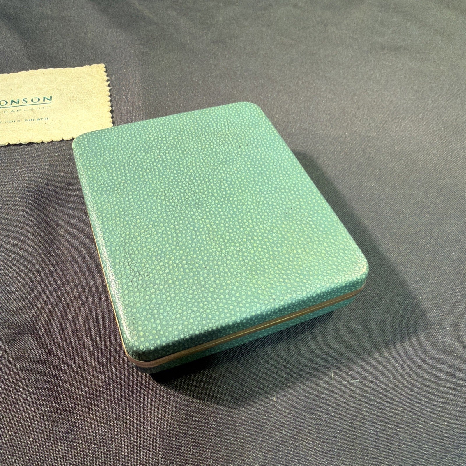 Ronson Varaflame Adonis 9ct Gold Sheath Lighter, box and cloth - (1999)